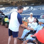 Scott Linebrink reaches out to Bobby Carter and other PALS at the ballpark.