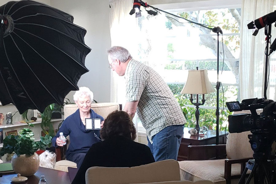 a behind-the-scenes shot of Jane and her client during their interview